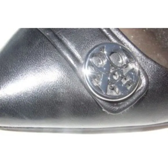 Coach 'Zhane' style, size 6B, black leather, slingback heels with a round chrome Coach logo accent
